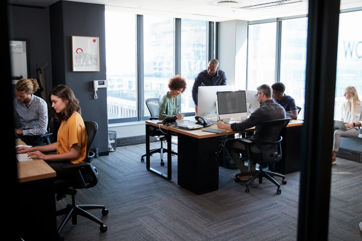 young creative team working together at computers